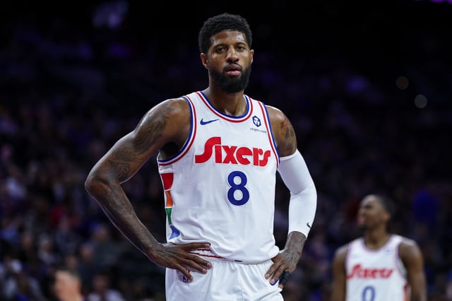 Paul George #8 of the Philadelphia 76ers looks on against the Golden State Warriors during the first half of the game at the Wells Fargo Center on March 1, 2025 in Philadelphia, Pennsylvania.