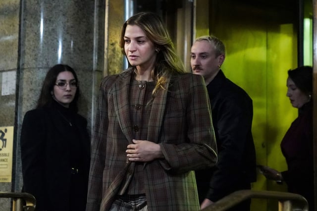 Grace Jabbari, second from left, the accuser in the assault case against Jonathan Majors, leaves court after giving testimony on December 5, 2023 in New York.