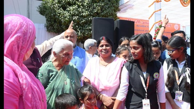 U.P. governor Anandiben Patel meeting girls during an event in Maharajganj district on March 17. (Sourced)