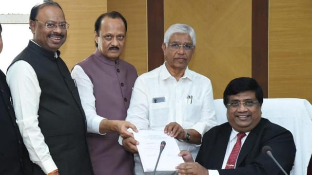 Sanjay Khodke (in white shirt) filed his nomination for the by-polls on Monday