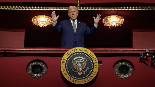 U.S. President Donald Trump looks down from the Presidential Box in the Opera House at the John F. Kennedy Center for the Performing Arts as he participates in a guided tour and leads a board meeting on March 17, 2025 in Washington, DC.