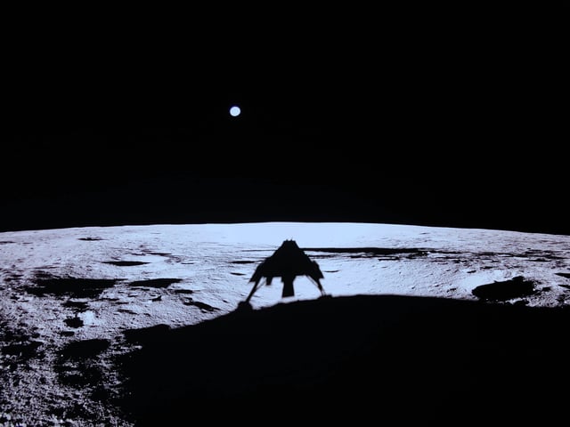 Shortly after landing, Blue Ghost sent back this stunning photo of its own shadow with the Earth above the lunar horizon. Credit: Firefly Aerospace