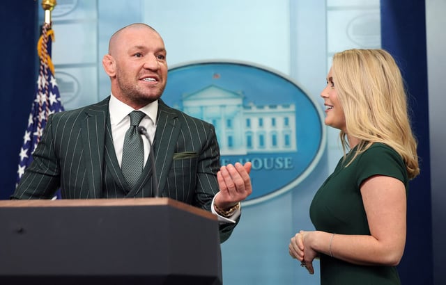 Irish MMA fighter Conor McGregor speaks at the briefing room lectern, with White House press secretary Karoline Leavitt at his side, during a visit to the White House on March 17, 2025.