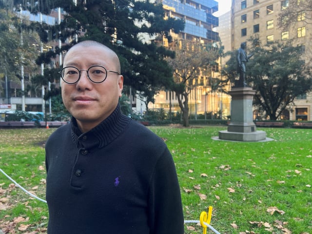 Australian lawyer Kevin Yam, who is among eight overseas-based Hong Kong activists who have bounties on them by Hong Kong authorities for alleged breaches of a Hong Kong national security law, poses for a photo in Sydney, Australia July 6, 2023. Yam, an Australian citizen, left Hong Kong in 2022 to return to live in Australia. He says he exercised his democratic rights in Australia to raise awareness of Hong Kong?s situation. REUTERS/Kirsty Needham/File photo