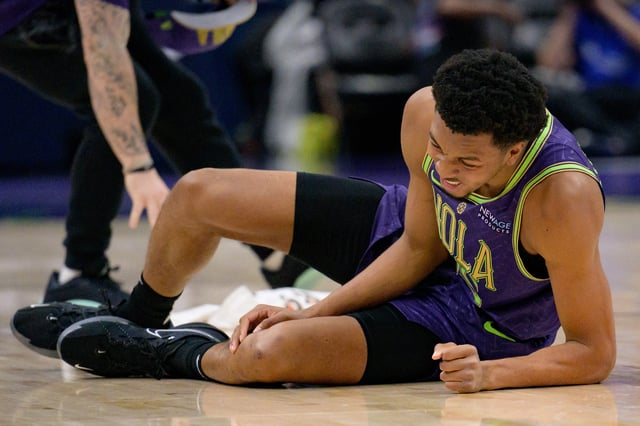 Mar 17, 2025; New Orleans, Louisiana, USA;  New Orleans Pelicans guard Trey Murphy III (25) reacts after falling after a steal by Detroit Pistons forward Ausar Thompson (9) during the first quarter at Smoothie King Center. Mandatory Credit: Matthew Hinton-Imagn Images