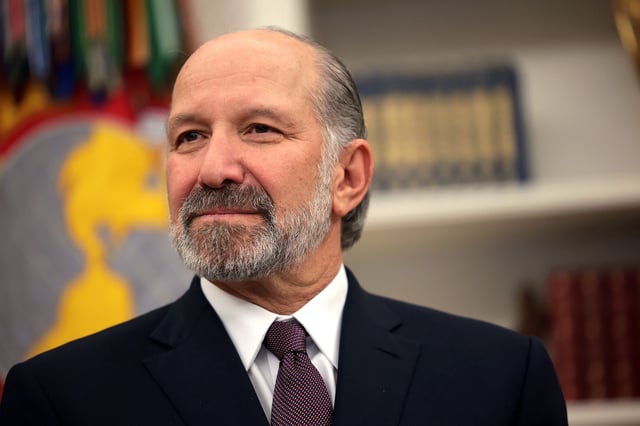 Howard Lutnick listens as President Donald Trump delivers remarks before Lutnick is sworn in as Commerce Secretary in the Oval Office at the White House on February 21, in Washington, DC.