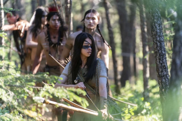 Amber Midthunder (front) leads a cast of mostly Native American actors in in Dan Trachtenberg&#39;s “Prey” (2022), the latest entry in the “Predator” film series.