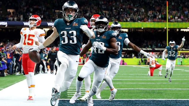 NEW ORLEANS, LOUISIANA - FEBRUARY 09: Cooper DeJean #33 of the Philadelphia Eagles celebrates scoring a touchdown after making an interception in the second quarter against the Kansas City Chiefs during Super Bowl LIX at Caesars Superdome on February 09, 2025 in New Orleans, Louisiana. (Photo by Gregory Shamus/Getty Images)