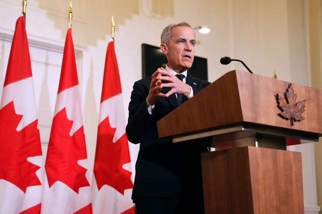 Prime Minister Mark Carney speaks to media during a press conference at Canada House, in London, Monday, March 17, 2025. 