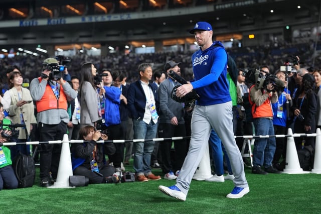Freddie Freeman of the Dodgers enters the field for the warm up prior to the game against Chicago Cubs at Tokyo Dome on March 18, 2025 in Tokyo, Japan. (Photo by Masterpress/Getty Images)