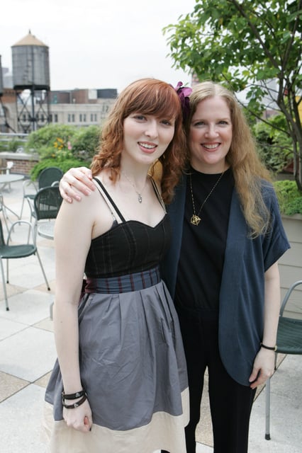 Author Suzanne Collins and Scolastic essay winner Kayley Hyde, 17 on the rooftop of the Scholastic offices in New York City on August 12, 2009.