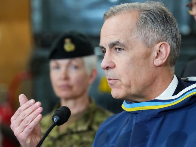 Prime Minister Mark Carney makes an announcement at a Canadian Armed Forces forward-operating location in Iqaluit, Nunavut, on Tuesday, March 18, 2025. THE CANADIAN PRESS/Sean Kilpatrick