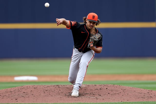 PHOENIX, ARIZONA - MARCH 14: Starting pitcher Jordan Hicks #12 of the San Francisco Giants throws during the second inning of a spring training game against the Milwaukee Brewers at American Family Fields of Phoenix on March 14, 2025 in Phoenix, Arizona.