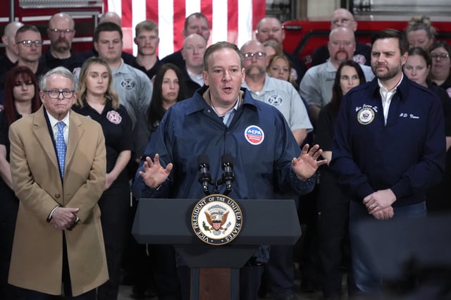 FILE - Vice President JD Vance, right, and Ohio Gov. Mike DeWine, left, listen as Environmental Protection Agency administrator Lee Zeldin, center, speaks in East Palestine Fire Station on Feb 3, 2025, in East Palestine, Ohio, Feb. 3, 2025. (AP Photo/Gene J. Puskar, File)