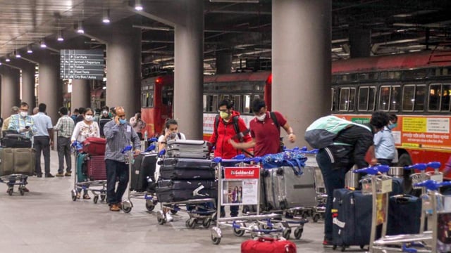 Mumbai: Indian nationals who were stranded in Singapore arrive by Air India flight at Mumbai International Airport after being evacuated by the government under 'Vande Bharat' mission, during the ongoing COVID-19 lockdown, in Mumbai, Sunday, May 10, 2020. (PTI Photo)(PTI10-05-2020_000260B) (PTI)