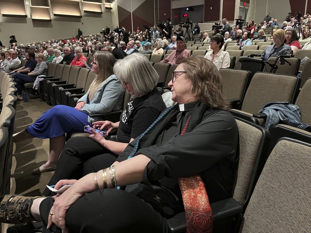 Attendees sit during a town hall with U.S. Rep. Mike Flood, R-Neb., on Tuesday, March 18, 2025, in Columbus, Neb. Many attendees demanded answers over Flood's support for President Donald Trump's policies. (AP Photo/Margery Beck)