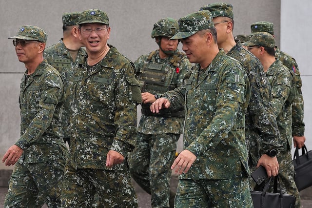 Defence Minister Wellington Koo inspects troops during a live fire exercise at the Fangshan training grounds in Pingtung, Taiwan August 26, 2024. REUTERS/Ann Wang/File Photo