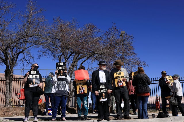 People protest outside the Immigration and Customs Enforcement (ICE) facility after reports circulated that migrant activist Jeanette Vizguerra had been taken into custody by federal agents, in Aurora, Colorado, on Tuesday.
