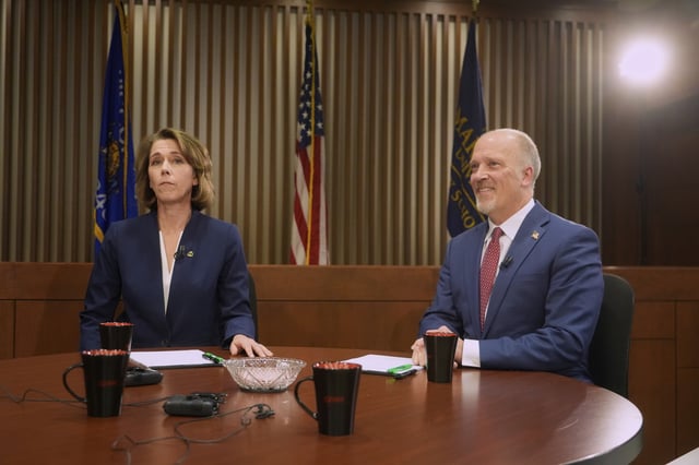 Wisconsin Supreme Court candidates Brad Schimel and Susan Crawford are seen before a debate Wednesday, March 12, 2025, in Milwaukee.