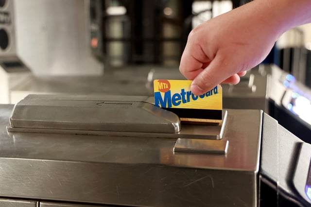 A passenger with a MetroCard in New York City in 2023.