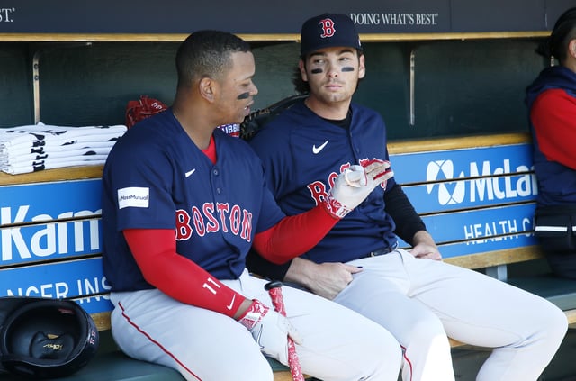 DETROIT, MI - APRIL 9: Rafael Devers #11 of the Boston Red Sox talks with Triston Casas #36 before their game against the Detroit Tigers at Comerica Park on April 9, 2023, in Detroit, Michigan