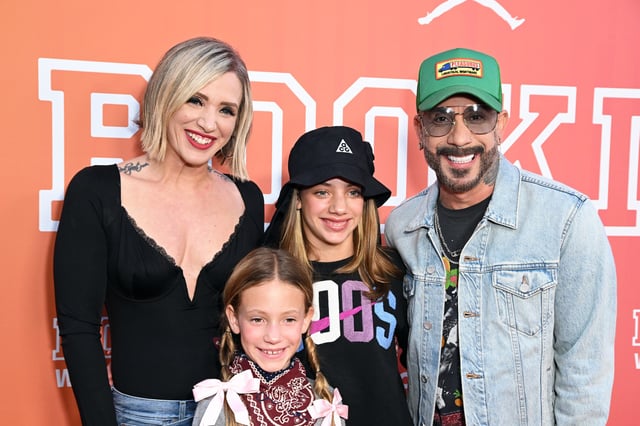 AJ McLean with daughters Elliott (second from right) and Lyric and estranged wife Rochelle in 2024.