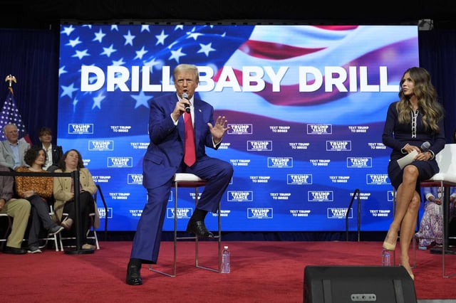 President Donald Trump at a campaign town hall in Oaks, Pa. in October, as moderator South Dakota Gov. Kristi Noem listens. 