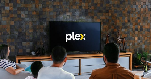 An image showing people watching TV with the Plex logo