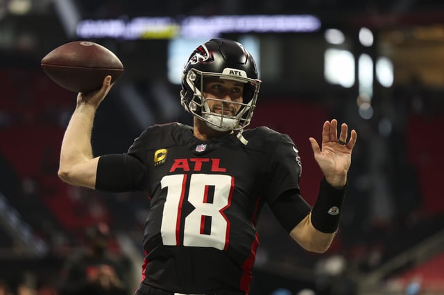 Kirk Cousins #18 of the Atlanta Falcons warms up prior to an NFL football game against the Carolina Panthers at Mercedes-Benz Stadium on January 5, 2025.