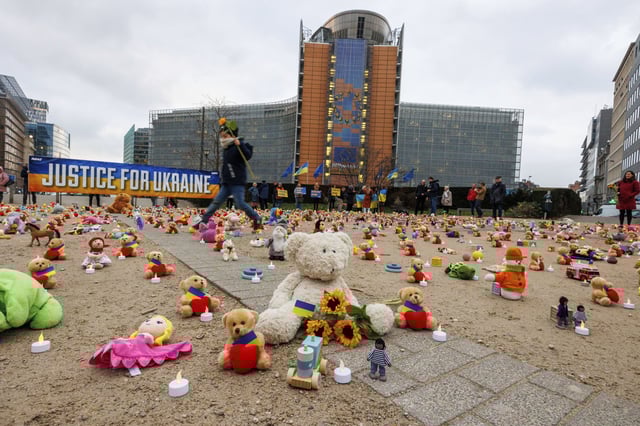 Members of the non-profit Avaaz and Ukrainian refugees placed thousands of kids&#39; teddy bears and toys at Schuman Roundabout in front of the European Commission in Brussels a vigil for the abduction of thousands of Ukrainian children by Russia on February 23, 2022.