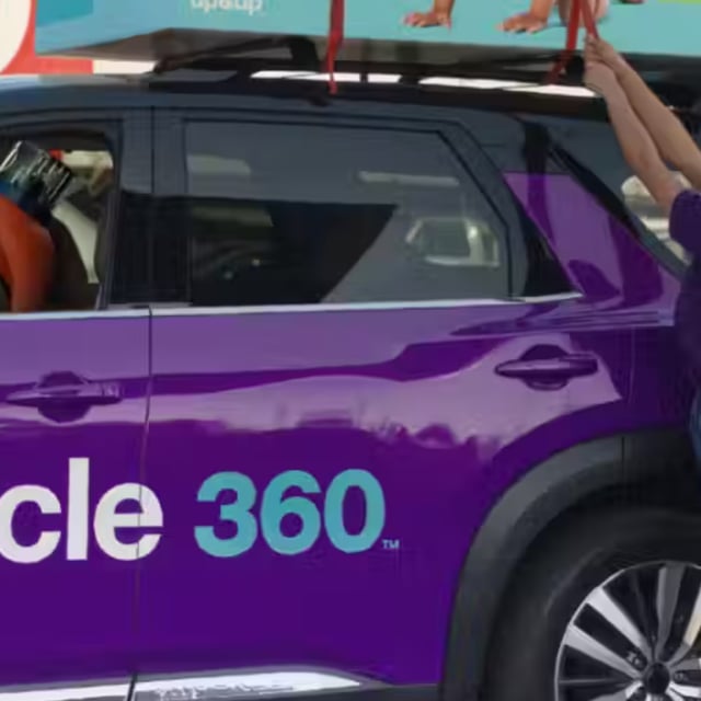 woman loading purple Target Circle 360 car