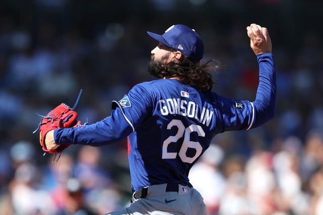 MESA, ARIZONA - FEBRUARY 21: Tony Gonsolin #26 of the Los Angeles Dodgers pitches during the first inning of a spring training game against the Chicago Cubs at Sloan Park on February 21, 2025 in Mesa, Arizona.