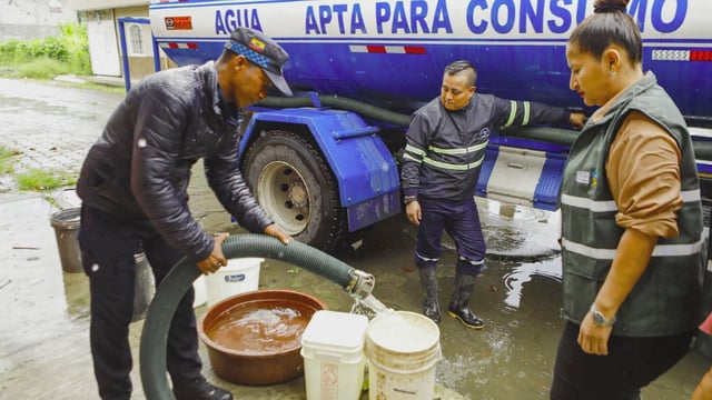 Operative supplying water in regions affected by oil spill in Ecuador