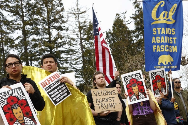 Protesters gather at a rally Wednesday at UC Berkeley protesting actions and threats by the Trump administration.