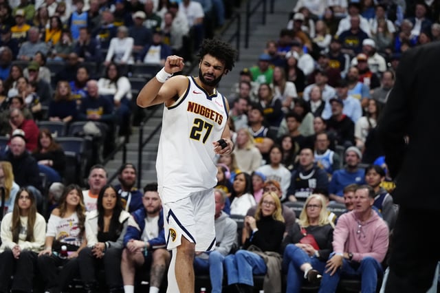 Mar 15, 2025; Denver, Colorado, USA; Denver Nuggets center Nikola Jokic (15) reacts to a leg injury in the fourth quarter against the Washington Wizards at Ball Arena. Mandatory Credit: Ron Chenoy-Imagn Images/File Photo