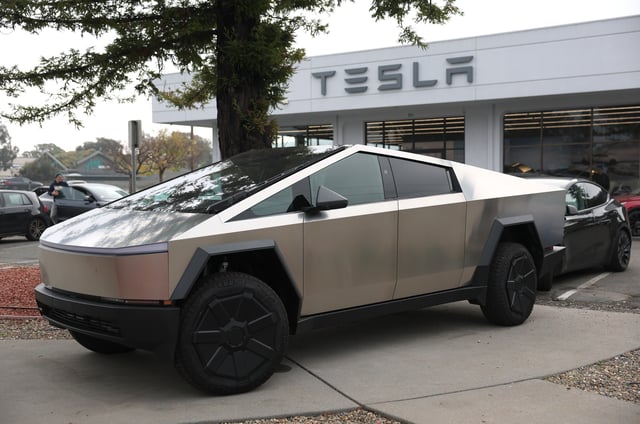 A Tesla Cybertruck is displayed at a Tesla dealership on December 20, 2024 in Corte Madera, California. (Photo by Justin Sullivan/Getty Images)