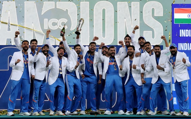 Cricket - ICC Men's Champions Trophy - Final - India v New Zealand - Dubai International Stadium, Dubai, United Arab Emirates - March 9, 2025 General view as India players celebrate with the trophy on the podium after winning the ICC Men's Champions Trophy REUTERS/Satish Kumar/File Photo