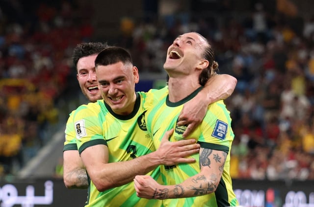 Soccer Football - World Cup - AFC Qualifiers - Third Round - Group C - Australia v Indonesia - Allianz Stadium, Sydney, Australia - March 20, 2025 Australia's Jackson Irvine celebrates with Lewis Miller after scoring their third goal REUTERS/Hollie Adams