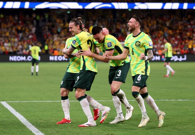Soccer Football - World Cup - AFC Qualifiers - Third Round - Group C - Australia v Indonesia - Allianz Stadium, Sydney, Australia - March 20, 2025 Australia's Jackson Irvine celebrates with teammates after scoring their third goal REUTERS/Hollie Adams