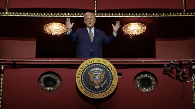U.S. President Donald Trump looks down from the Presidential Box in the Opera House at the John F. Kennedy Center for the Performing Arts