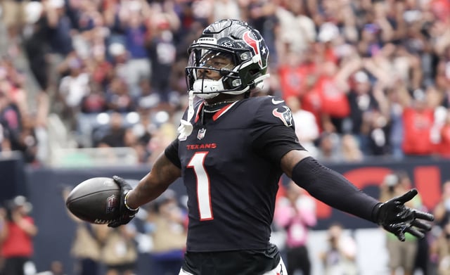 Sep 29, 2024; Houston, Texas, USA; Houston Texans wide receiver Stefon Diggs (1) scores against the Jacksonville Jaguars in the first quarter at NRG Stadium. Mandatory Credit: Thomas Shea-Imagn Images/File Photo