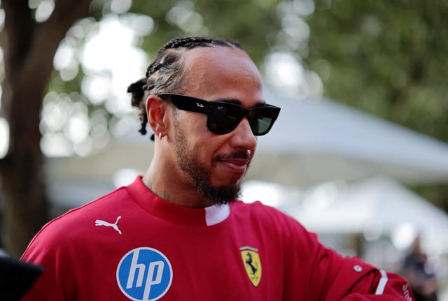 Formula One F1 - Australian Grand Prix - Qualifying - Albert Park Grand Prix Circuit, Melbourne, Australia - March 15, 2025 Ferrari's Lewis Hamilton before practice REUTERS/Mark Peterson/File Photo