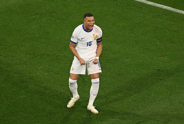 Kylian Mbappe of France celebrates after Randal Kolo Muani of France (not pictured) scores his team&#39;s first goal during the UEFA EURO 2024 Semi-Final match between Spain and France at Munich Football Arena on July 09, 2024 in Munich, Germany.