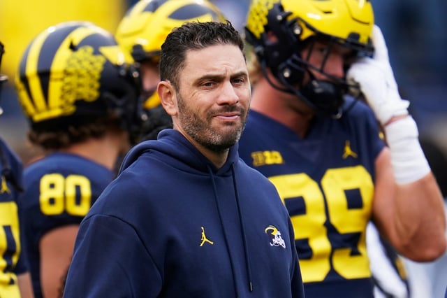 Michigan co-offensive coordinator and quarterbacks coach Matt Weiss before an NCAA college football game in Ann Arbor, Mich., in 2022.