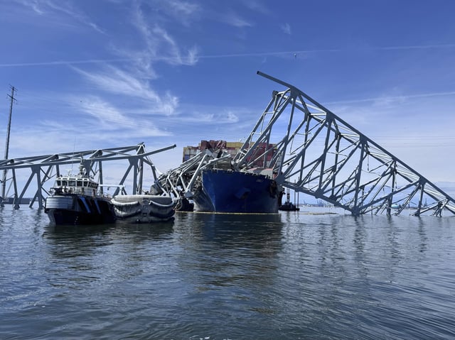 FILE - The fallen Francis Scott Key Bridge in Baltimore is pictured March 31, 2024, where divers assisted crews with the complicated and meticulous operation of removing steel and concrete. (AP Photos/Mike Pesoli, file)