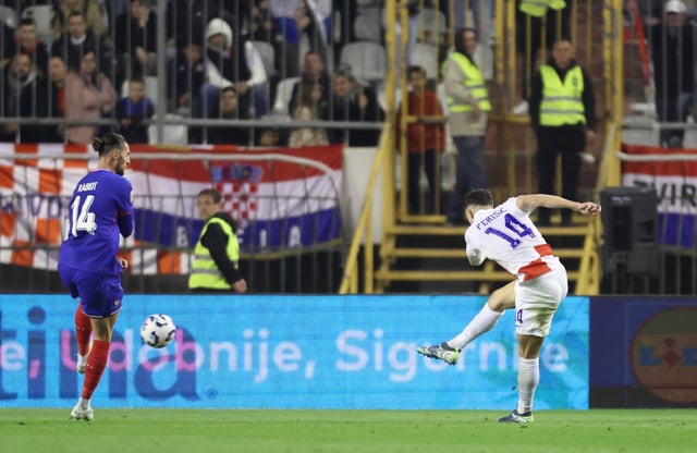 Soccer Football - Nations League - Quarter Final - First Leg - Croatia v France - Stadion Poljud, Split, Croatia - March 20, 2025 Croatia's Ivan Perisic scores their second goal REUTERS/Antonio Bronic