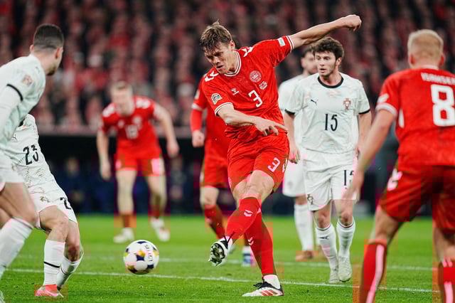 Soccer Football - Nations League - Quarter Final - First Leg - Denmark v Portugal - Parken, Copenhagen, Denmark - March 20, 2025  Denmark's Jannik Vestergaard shoots at goal  Liselotte Sabroe/Ritzau Scanpix via REUTERS