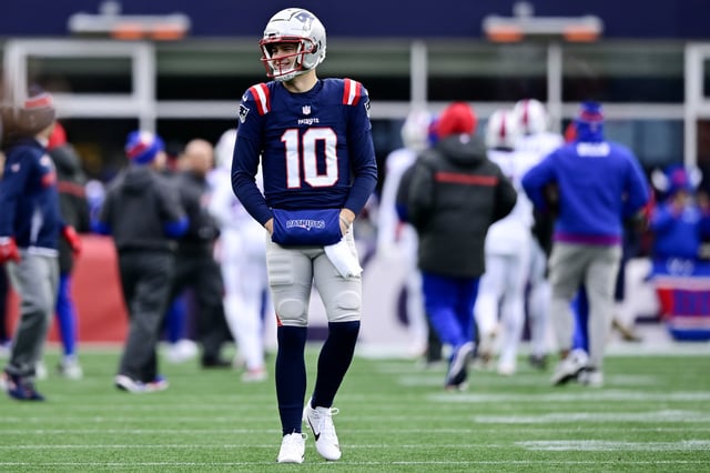 Drake Maye #10 of the New England Patriots on the field before the game against the Buffalo Bills at Gillette Stadium on January 05, 2025.