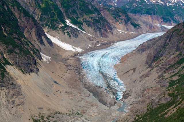The tongue of the Salmon glacier in an eroded valley in British Columbia, Canada. Credit: Sébastien Lecocq / Alamy Stock Photo
