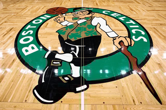 The Boston Celtics logo is seen on the court before a game between the Celtics and the Cleveland Cavaliers at TD Garden.